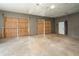 Garage space featuring large barn doors and potential access to the main building at 2334 Highway 278, Social Circle, GA 30025