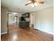 Open concept kitchen with appliances and ceiling fan at 2334 Highway 278, Social Circle, GA 30025