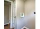 Tan room with white trim and wood-look floors at 2334 Highway 278, Social Circle, GA 30025