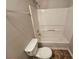 Compact bathroom offering a toilet, shower, and essential fixtures for daily use at 6531 Gina Agha Cir, Lithonia, GA 30038