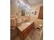 Bathroom with granite vanity, tiled walls, and updated fixtures at 831 Sinyard Rd, Lithia Springs, GA 30122