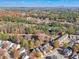 Aerial view of houses and lake, showcasing community setting at 589 Lantern Wood Dr, Scottdale, GA 30079