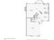 Main floor plan showcasing living room, kitchen, and garage at 589 Lantern Wood Dr, Scottdale, GA 30079