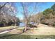 Community gazebo with seating near pond at 589 Lantern Wood Dr, Scottdale, GA 30079