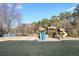 Community playground with lake view at 589 Lantern Wood Dr, Scottdale, GA 30079