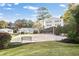 Sand volleyball court with bench, surrounded by landscaping at 1150 Collier Nw Rd # K9, Atlanta, GA 30318