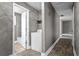 Hallway provides access to the bathroom and laundry areas, providing a functional transition space at 2436 Clarissa Nw Dr, Atlanta, GA 30318