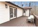 Charming outdoor deck featuring modern furniture with french doors and classic cottage styling at 6881 Hickory Hollow Dr, Douglasville, GA 30135