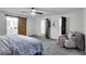 Bright bedroom with a barn door access to the primary bathroom at 6881 Hickory Hollow Dr, Douglasville, GA 30135