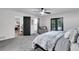 Bright bedroom featuring plush carpeting, and French doors leading to an outdoor area at 6881 Hickory Hollow Dr, Douglasville, GA 30135