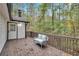 Deck with wooden bench overlooking wooded area at 6881 Hickory Hollow Dr, Douglasville, GA 30135