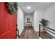 Bright entryway with red front door and modern decor at 6881 Hickory Hollow Dr, Douglasville, GA 30135