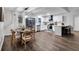 Renovated kitchen with white cabinets, stainless steel appliances and an island at 6881 Hickory Hollow Dr, Douglasville, GA 30135