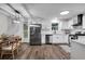 Modern kitchen with white cabinets, stainless steel appliances at 6881 Hickory Hollow Dr, Douglasville, GA 30135