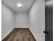 Large walk in closet with wood look floors at 6881 Hickory Hollow Dr, Douglasville, GA 30135