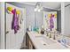 This bathroom features a double sink vanity with a large mirror and ample counter space at 3530 Fairlane Nw Dr, Atlanta, GA 30331