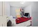 Cozy bedroom offering a peaceful retreat with natural light at 3530 Fairlane Nw Dr, Atlanta, GA 30331
