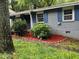 Charming single-story home featuring blue shutters and lush landscaping at 3530 Fairlane Nw Dr, Atlanta, GA 30331