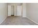 Spacious bedroom with neutral walls, carpet, and closet at 3100 Aberdeen Way, Lithonia, GA 30038
