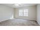 Spacious bedroom with neutral walls and carpet flooring at 3100 Aberdeen Way, Lithonia, GA 30038