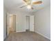Bedroom with ceiling fan and access to hallway at 3100 Aberdeen Way, Lithonia, GA 30038