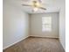 Bedroom with ceiling fan and neutral walls at 3100 Aberdeen Way, Lithonia, GA 30038