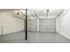 Two-car garage with painted floor and automatic openers at 3100 Aberdeen Way, Lithonia, GA 30038
