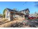 Tan two-story house with a backyard at 3100 Aberdeen Way, Lithonia, GA 30038