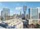 Wide city skyline view from building with modern architecture and blue skies in background at 3325 Piedmont Ne Rd # 1708, Atlanta, GA 30305