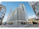 Modern high-rise exterior showcasing its sleek architectural design against a blue sky at 3325 Piedmont Ne Rd # 1708, Atlanta, GA 30305