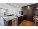 Modern kitchen with granite countertops, stainless steel appliances, and ample cabinet space at 3325 Piedmont Ne Rd # 1708, Atlanta, GA 30305