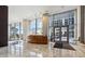 Modern lobby with marble floors, wood reception desk, and ample natural light at 3325 Piedmont Ne Rd # 1708, Atlanta, GA 30305