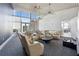 Bright lounge area features stylish seating, modern lighting, and city views through expansive windows at 3325 Piedmont Ne Rd # 1708, Atlanta, GA 30305