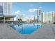 Enjoy a refreshing swim in the rooftop pool with stunning city skyline views on a sunny day at 3325 Piedmont Ne Rd # 1708, Atlanta, GA 30305