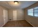 Bright bedroom with neutral walls and carpet flooring at 5090 Great Meadows Rd, Lithonia, GA 30038
