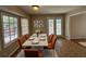Bright dining room with a white table and orange chairs at 5090 Great Meadows Rd, Lithonia, GA 30038