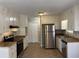 Modern kitchen with stainless steel appliances and ample cabinetry at 5090 Great Meadows Rd, Lithonia, GA 30038