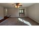Open living room with a view into another room at 5090 Great Meadows Rd, Lithonia, GA 30038