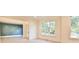 Open living room with hardwood floors, built-in shelves, and fireplace at 816 Hillwood Dr, Marietta, GA 30068