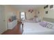 Bright bedroom with two beds, hardwood floors, a dresser, and wall decorations at 1150 Collier Nw Rd # 4B, Atlanta, GA 30318