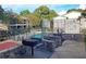 Community grill and seating area, perfect for outdoor gatherings and enjoying summer barbecues at 1150 Collier Nw Rd # 4B, Atlanta, GA 30318