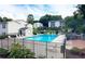 Sparkling community pool with lounge chairs, surrounded by well-maintained landscaping and inviting ambiance at 1150 Collier Nw Rd # 4B, Atlanta, GA 30318