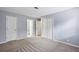 Bedroom features plush carpeting, neutral colored walls and access to the bathroom at 511 Barrington Hills Dr, Atlanta, GA 30350