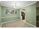 Dining room is freshly painted with trim, a modern light and connects to the kitchen at 511 Barrington Hills Dr, Atlanta, GA 30350