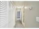 Hallway showcases multiple storage closets and access to bathroom and bedroom at 511 Barrington Hills Dr, Atlanta, GA 30350