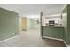 Living room flows into the dining room and kitchen in an open concept design at 511 Barrington Hills Dr, Atlanta, GA 30350