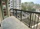 Private balcony overlooking city and trees at 795 Hammond Dr # 401, Atlanta, GA 30328