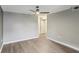 Simple bedroom with wood flooring and neutral wall colors at 795 Hammond Dr # 401, Atlanta, GA 30328