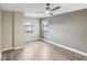 Spacious bedroom with wood flooring and neutral walls at 795 Hammond Dr # 401, Atlanta, GA 30328