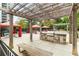 Outdoor kitchen with grill and pergola at 795 Hammond Dr # 401, Atlanta, GA 30328